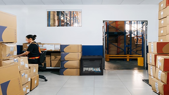 Employee working in stock room