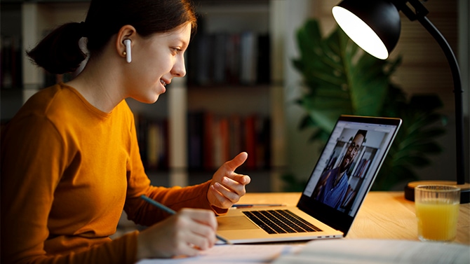 Person watching a live Intersight demo on their laptop